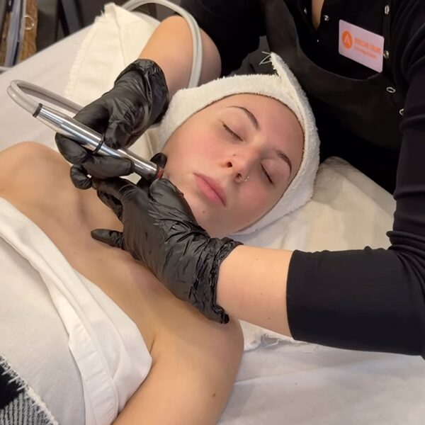 Facial Services being Performed with Hydrodermabrasion Technology at Aveda Arts Esthetics School