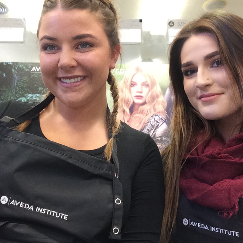 Gracyn with student friends showcasing student life at Aveda Arts