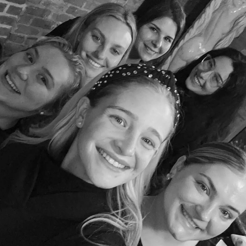 Aveda Arts Hammond esthiology student Avery Meyers gaining hands-on skincare training before beginning her esthetics career with friends and other students.