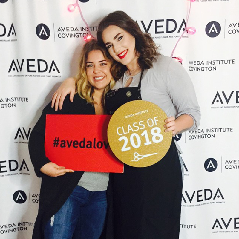 Gracyn practicing cosmetology techniques while attending the Aveda Arts Cosmetology program.