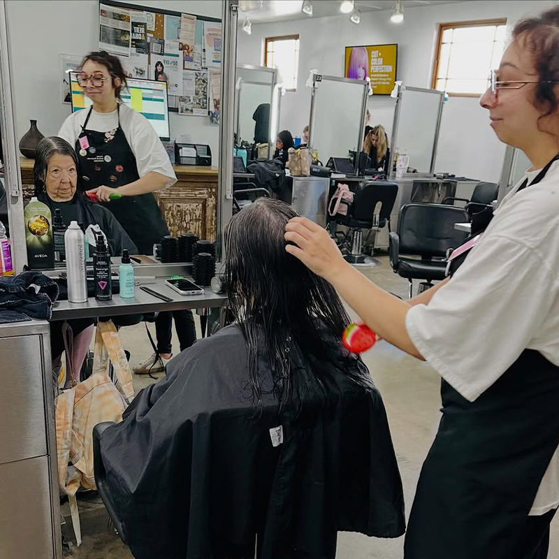 Beauty School Student performing hair service on her mom. Mother and Daughter Beauty School Story