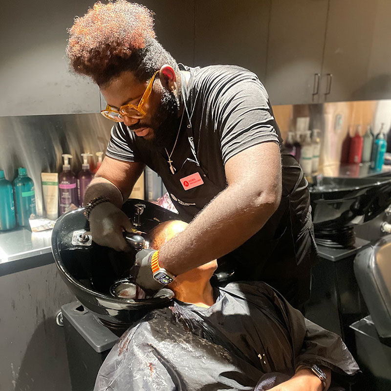 Aveda Arts Beauty School Student now Alumni Victor Shampooing Guest at the Bowl
