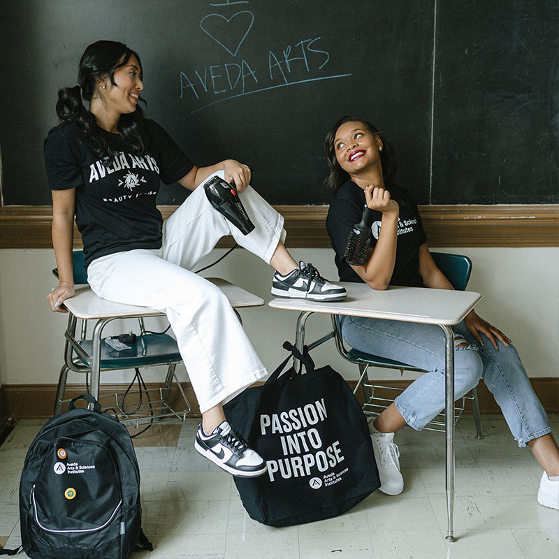 Students considering beauty school as an alternative to a four-year college in a classroom setting
